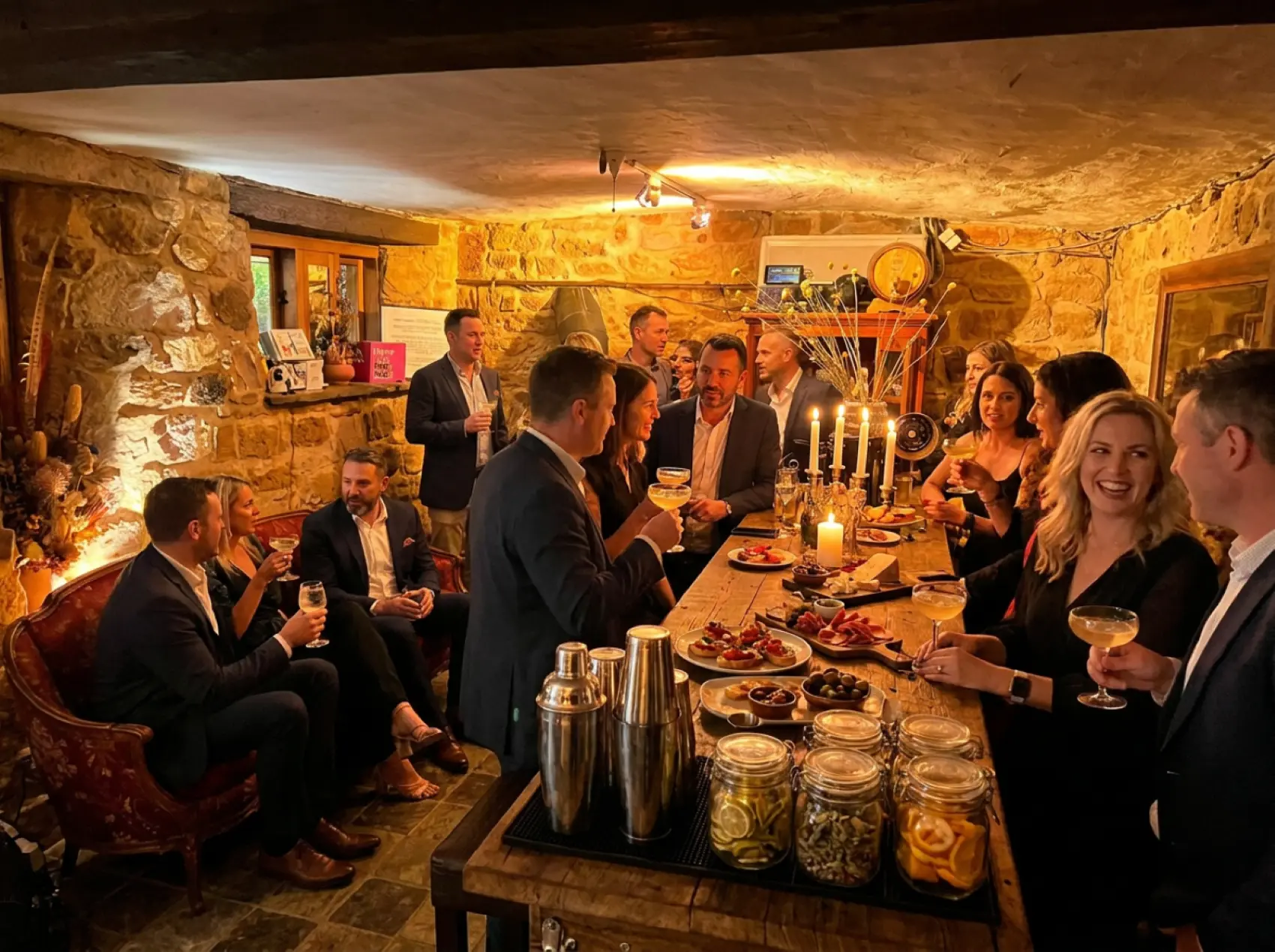 Candlelit stone tasting room at Three Little Birds Distillery set for an intimate reception